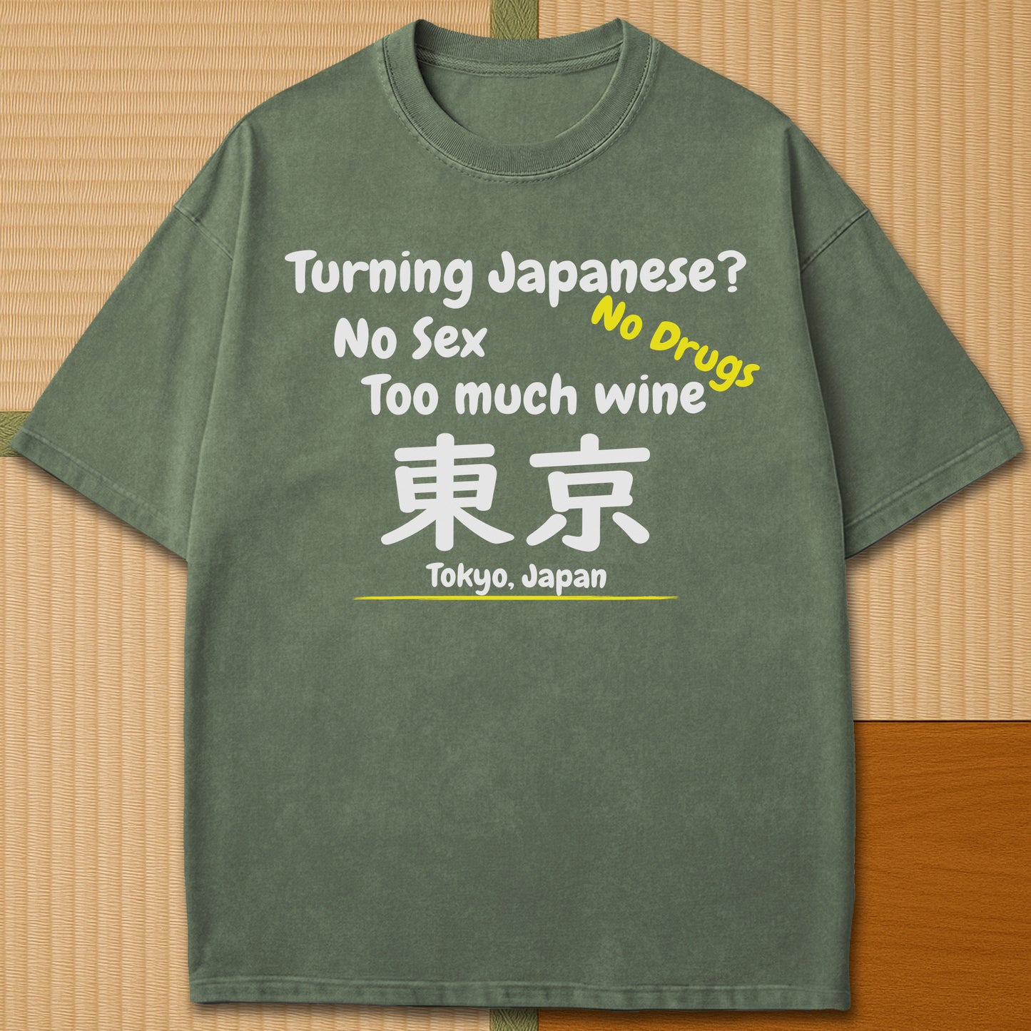Japanese-inspired cotton Turning Japanese T-Shirt in Moss on Comfort Colors 1717, styled in a modern flatlay scene.