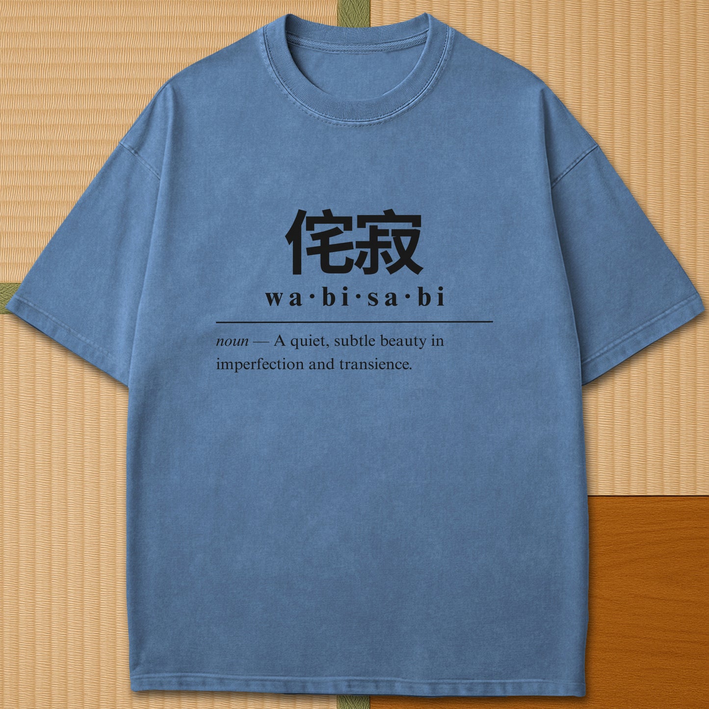Japanese-inspired cotton Wabisabi Japanese Dictionary T-Shirt in Blue Jean on Comfort Colors 1717, styled in a modern flatlay scene.
