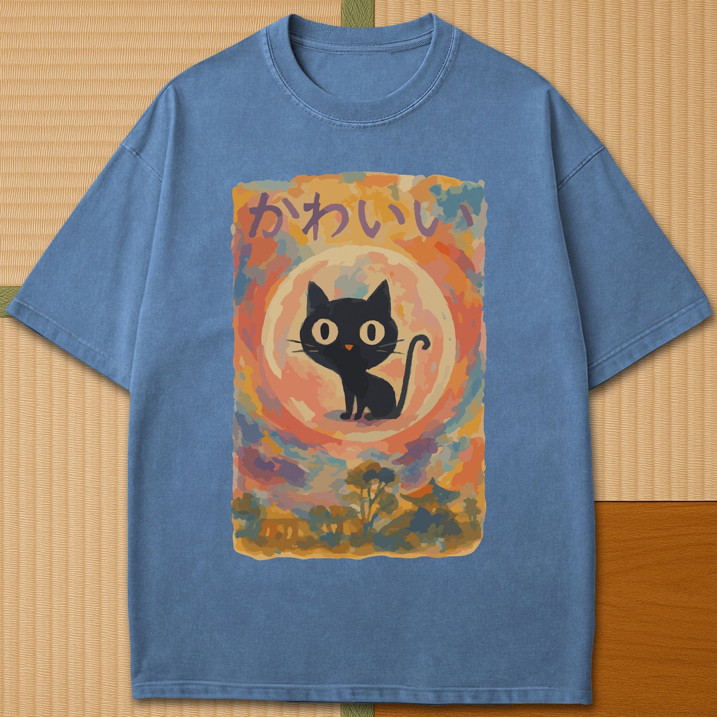 Japanese-inspired cotton Abstract Kawaii Cat Dreamscape T-Shirt in Blue Jean on Comfort Colors 1717, styled in a modern flatlay scene.