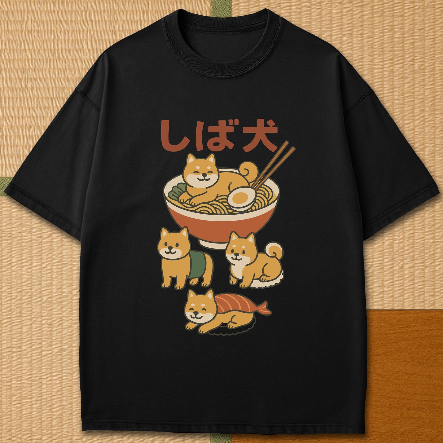 Japanese-inspired cotton Shiba Sushi Ramen Dreams T-Shirt in Black on Comfort Colors 1717, styled in a modern flatlay scene.