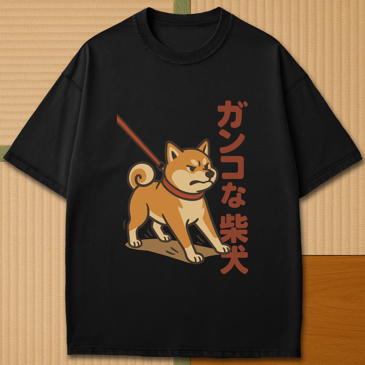 Japanese-inspired cotton Stubborn Shiba T-Shirt in Black on Comfort Colors 1717, styled in a modern flatlay scene.