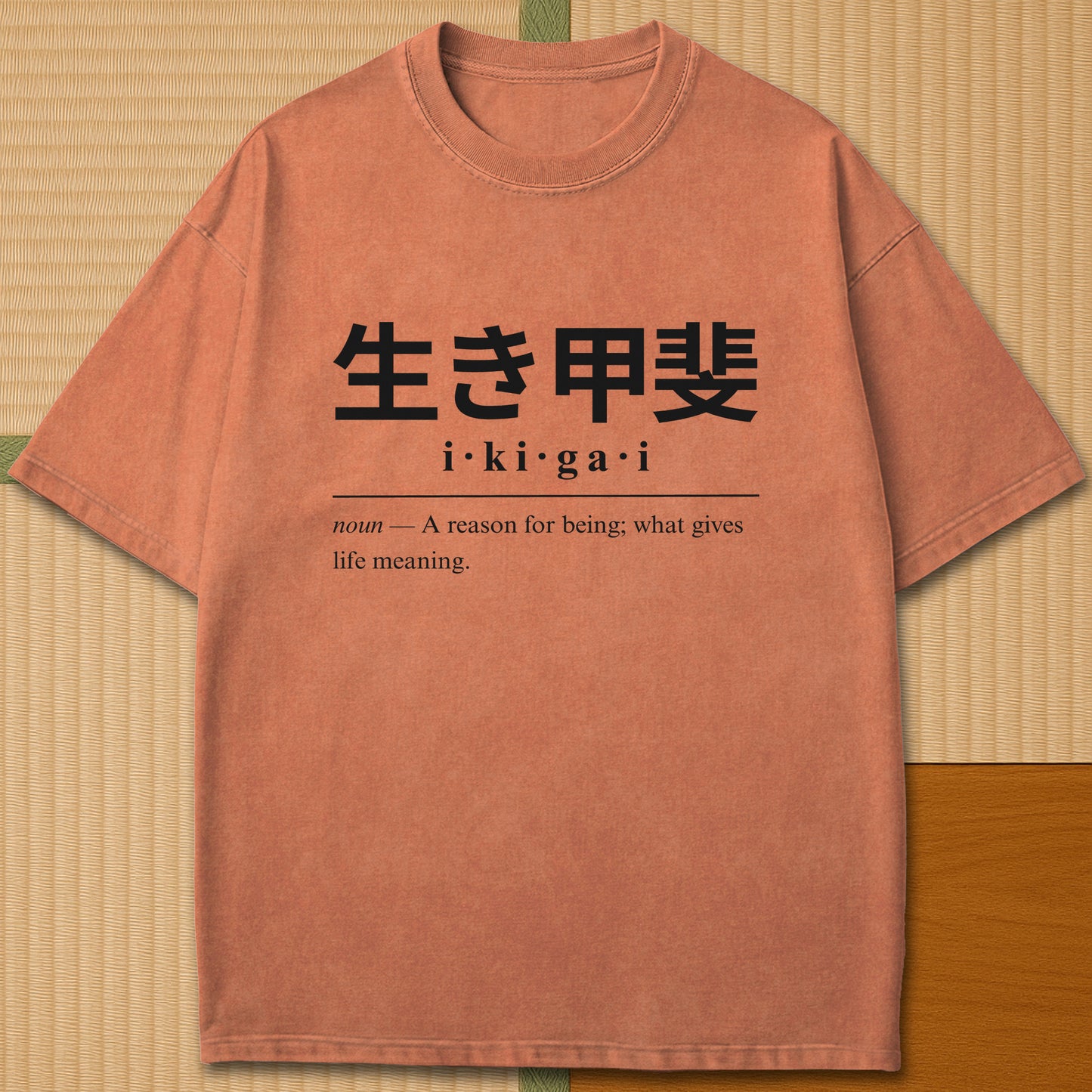 Japanese-inspired cotton Ikigai Japanese Dictionary T-Shirt in Yam on Comfort Colors 1717, styled in a modern flatlay scene.