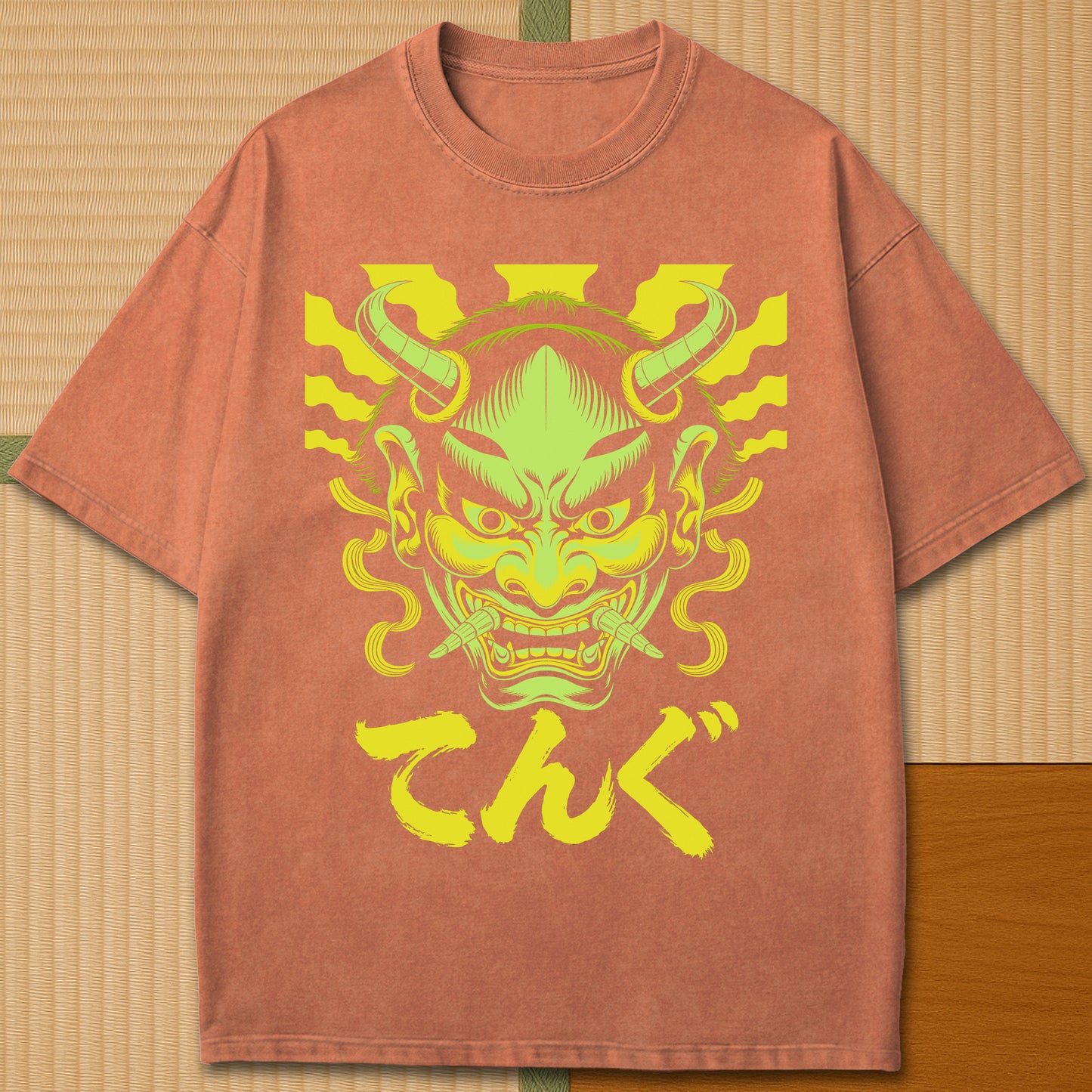 Japanese-inspired cotton Oni Tengu Rising T-Shirt in Yam on Comfort Colors 1717, styled in a modern flatlay scene.