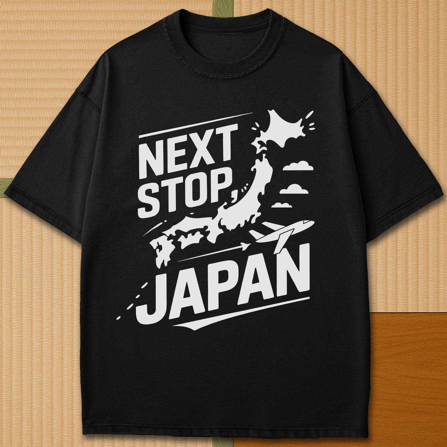 Japanese-inspired cotton Next Stop Japan T-Shirt in Black on Comfort Colors 1717, styled in a modern flatlay scene.
