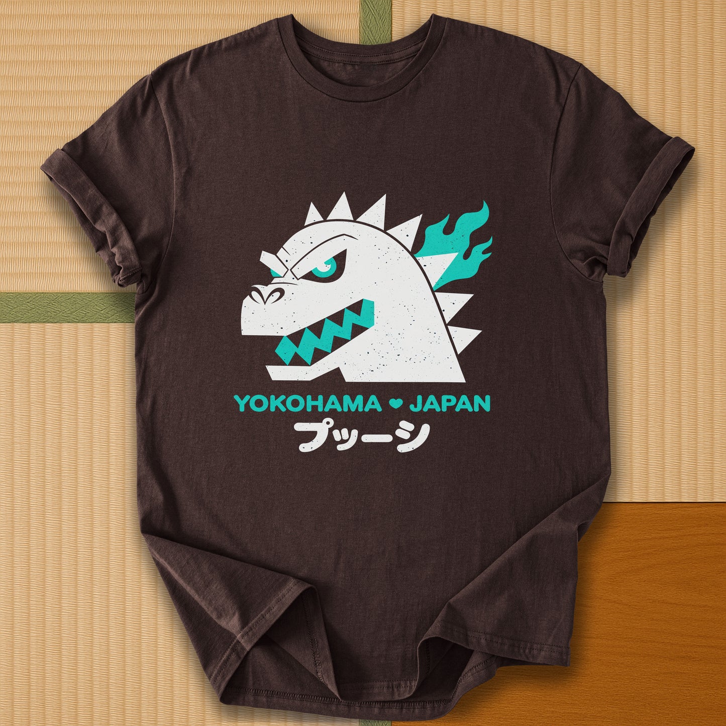 Japanese-inspired cotton Vintage Kaiju Godzilla T-Shirt in Dark Chocolate on Gildan 64000, styled in a modern flatlay scene