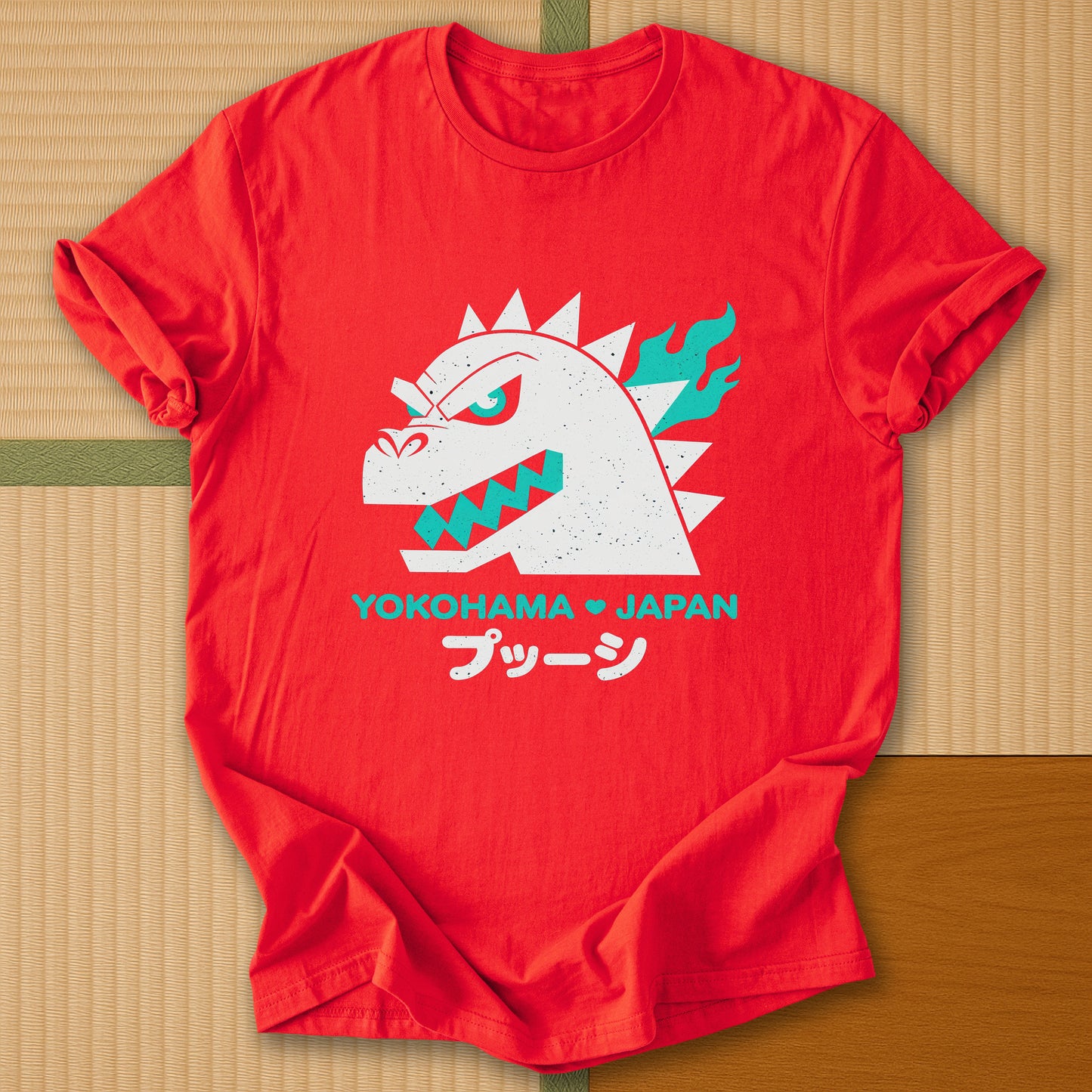 Japanese-inspired cotton Vintage Kaiju Godzilla T-Shirt in Red on Gildan 64000, styled in a modern flatlay scene