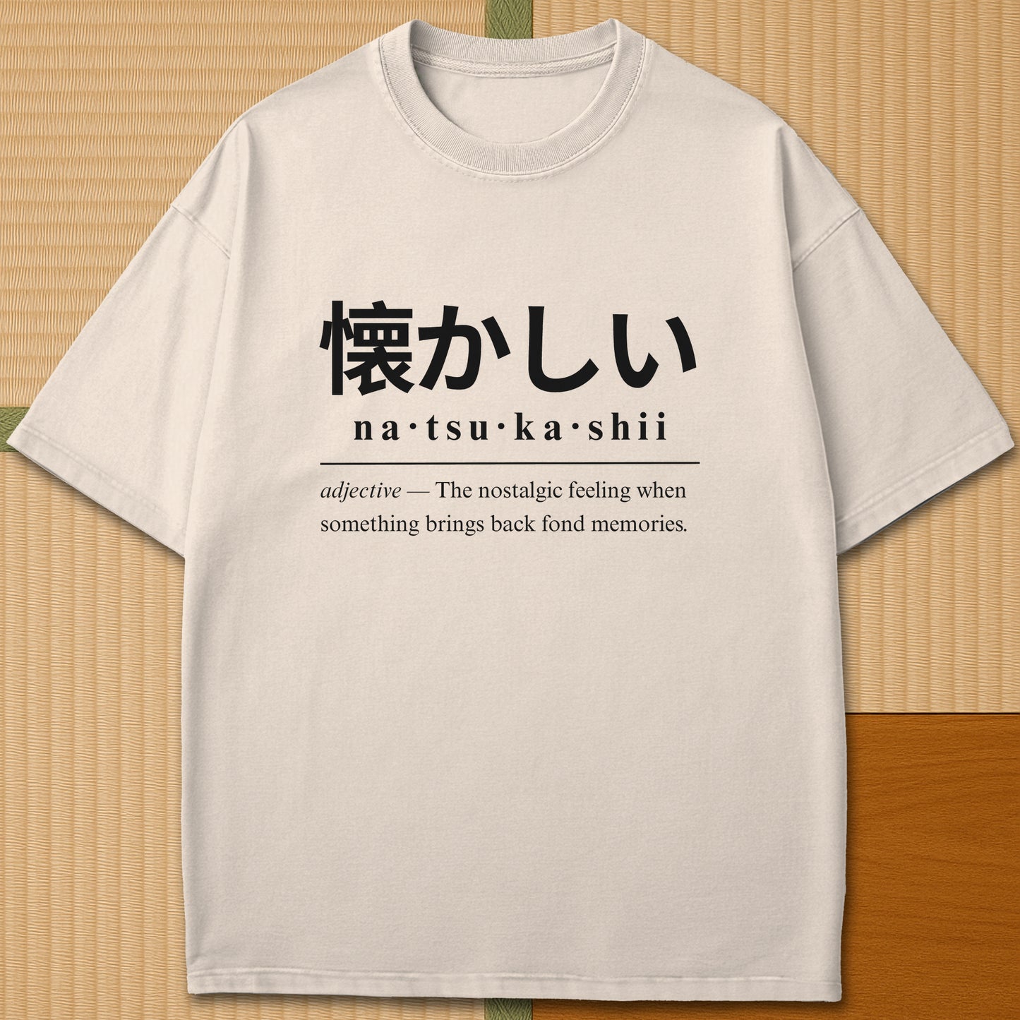 Japanese-inspired cotton Natsukashii Japanese Dictionary T-Shirt in Ivory on Comfort Colors 1717, styled in a modern flatlay scene.