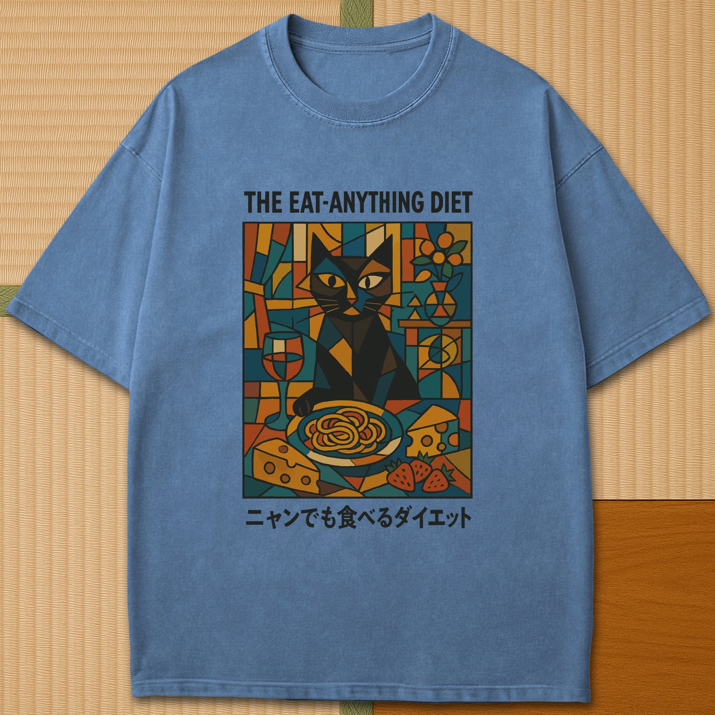 Japanese-inspired cotton Nyan Diet Club T-Shirt in Blue Jean on Comfort Colors 1717, styled in a modern flatlay scene.