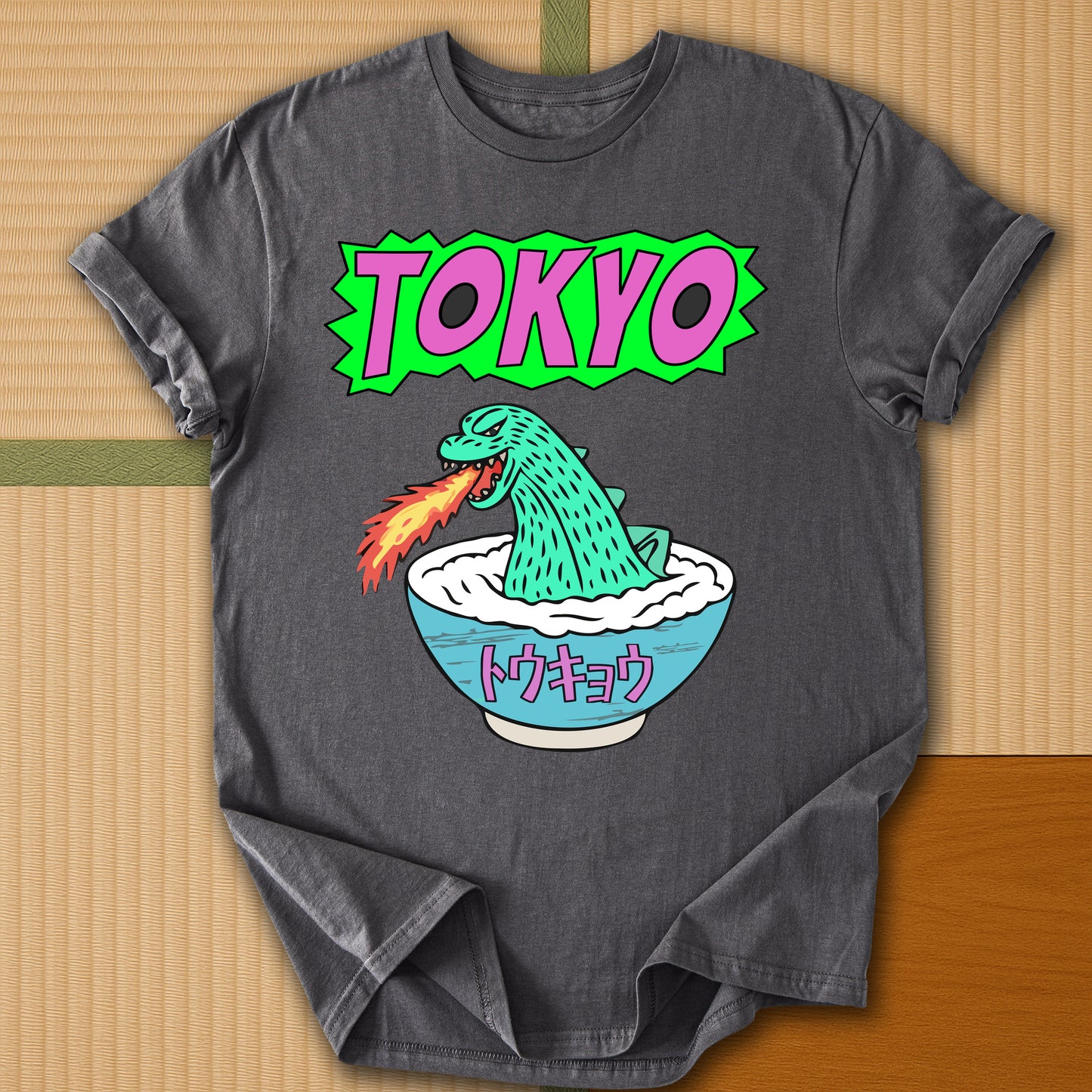 Japanese-inspired cotton Tokyo Kaiju T-Shirt in Charcoal on Gildan 64000, styled in a modern flatlay scene