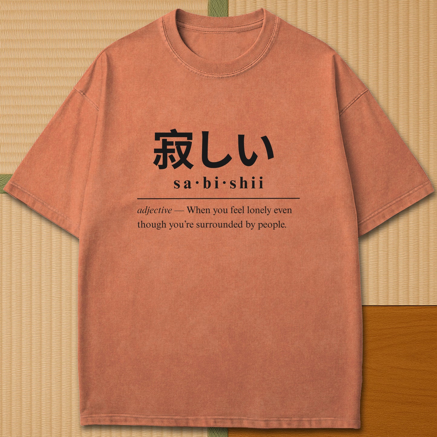 Japanese-inspired cotton Sabishii Japanese Dictionary T-Shirt in Yam on Comfort Colors 1717, styled in a modern flatlay scene.