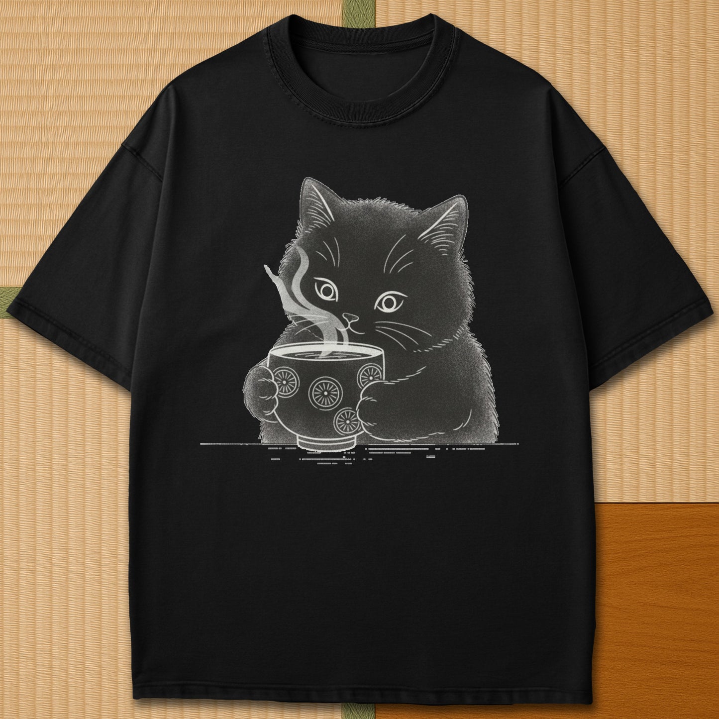 Japanese-inspired cotton Kitten Paws Tea Time T-Shirt in Black on Comfort Colors 1717, styled in a modern flatlay scene.