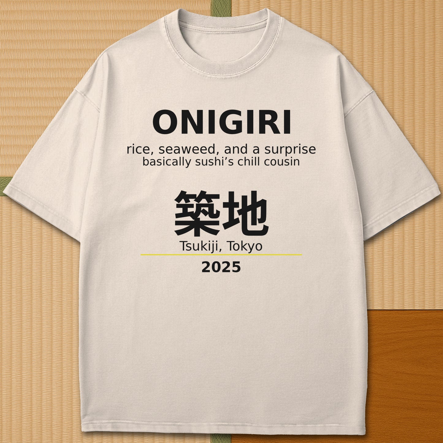 Japanese-inspired cotton Onigiri Tsukiji T-Shirt in Ivory on Comfort Colors 1717, styled in a modern flatlay scene.