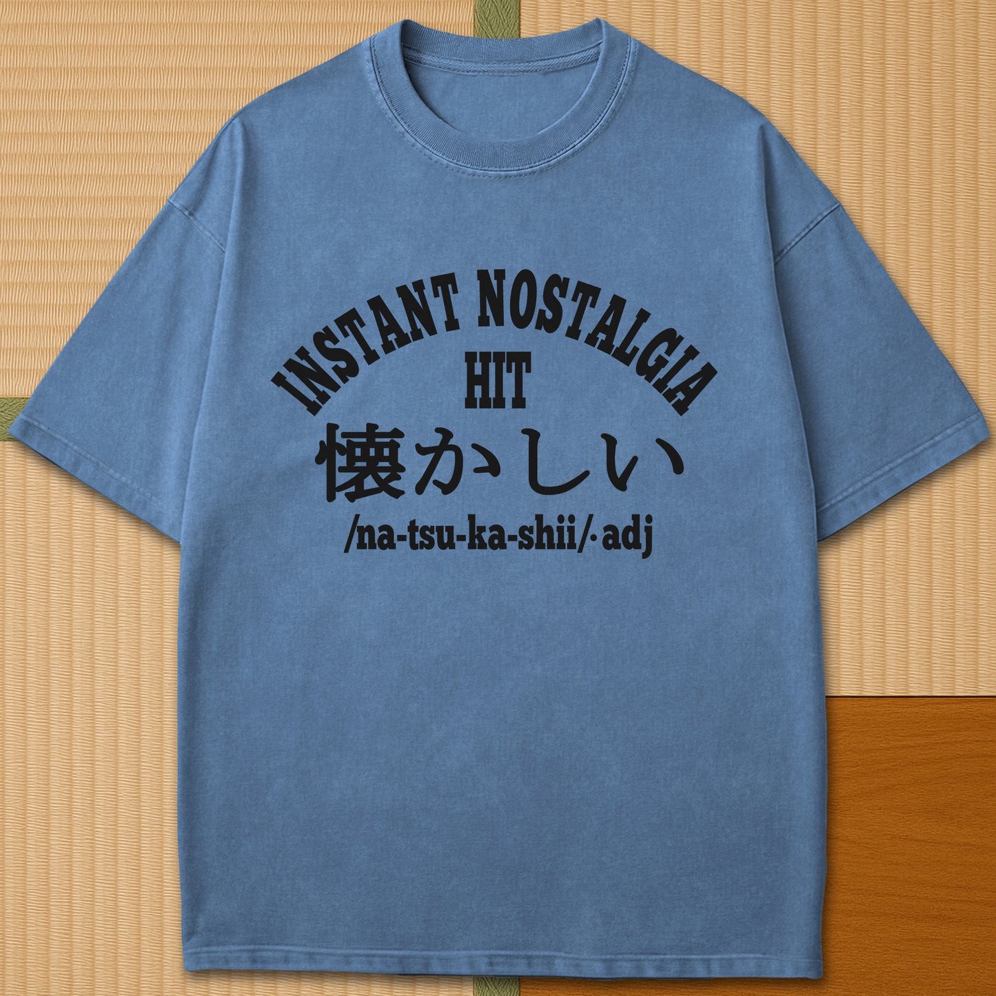 Japanese-inspired cotton Instant Nostalgia Hit T-Shirt in Blue Jean on Comfort Colors 1717, styled in a modern flatlay scene.