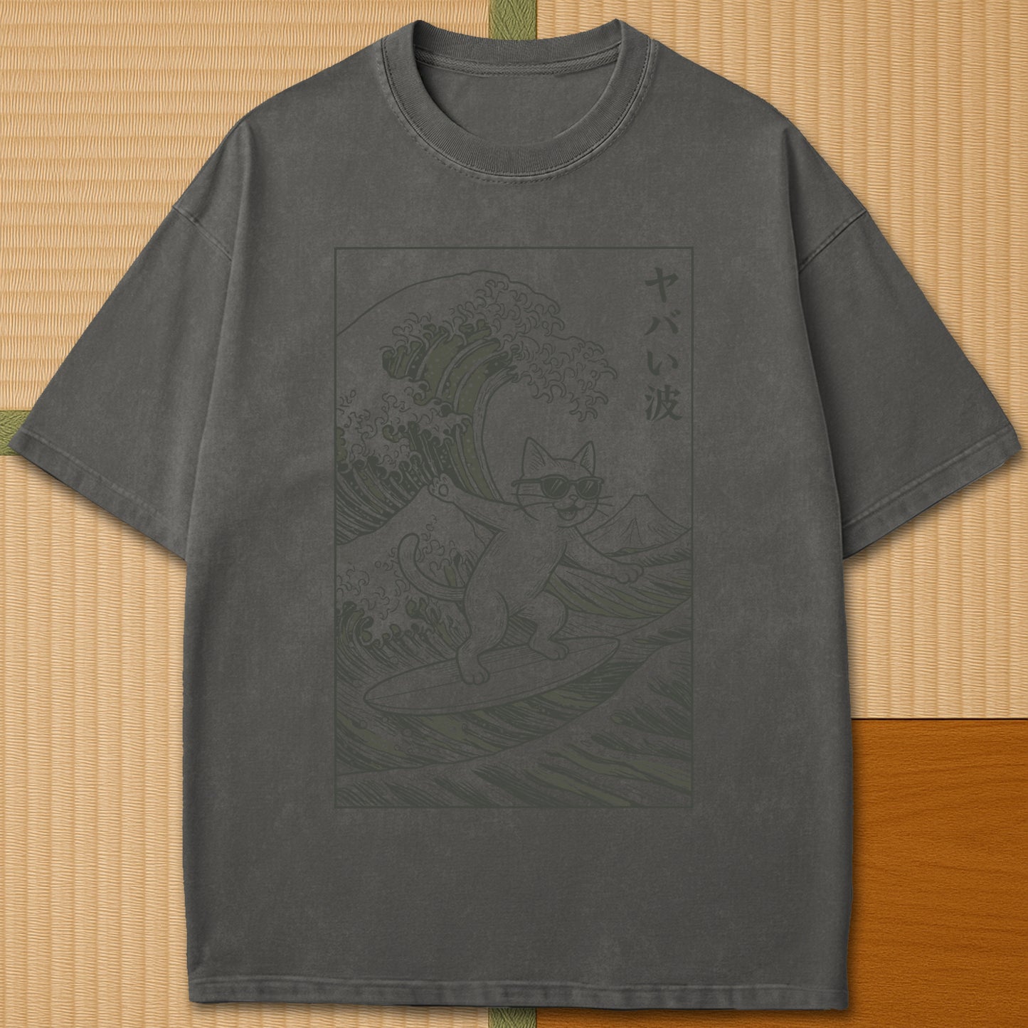 Japanese-inspired cotton Yabai Wave Cat T-Shirt in Pepper on Comfort Colors 1717, styled in a modern flatlay scene.