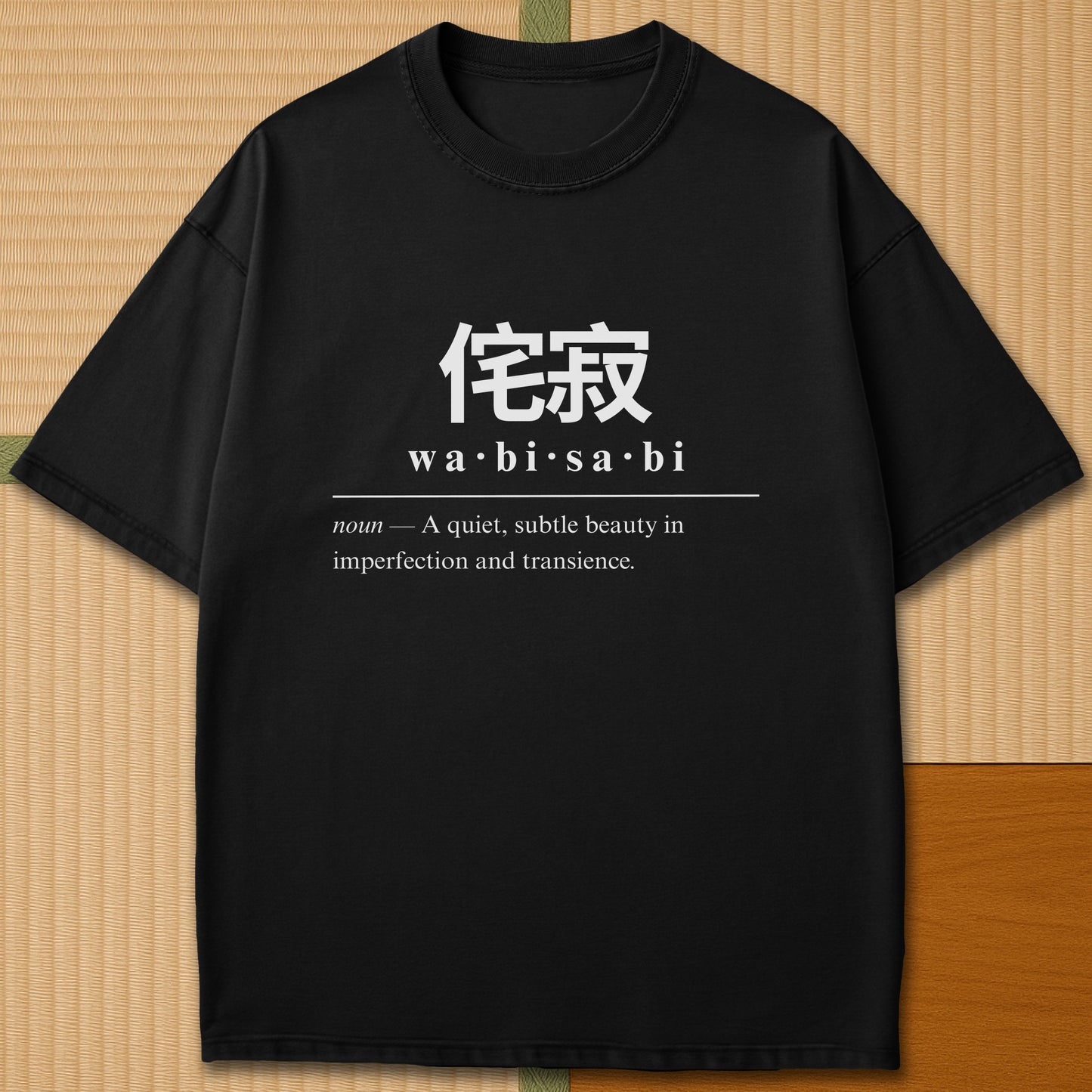 Japanese-inspired cotton Wabisabi Japanese Dictionary T-Shirt in Black on Comfort Colors 1717, styled in a modern flatlay scene.
