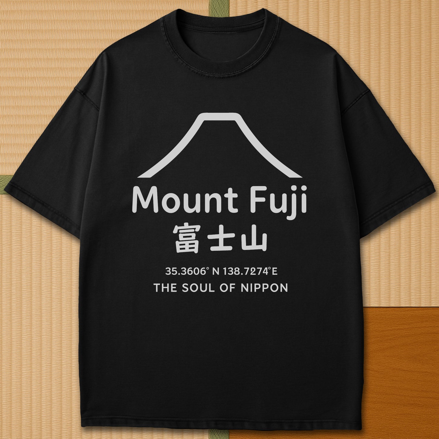 Japanese-inspired cotton Mount Fuji Japan T-Shirt in Black on Comfort Colors 1717, styled in a modern flatlay scene.