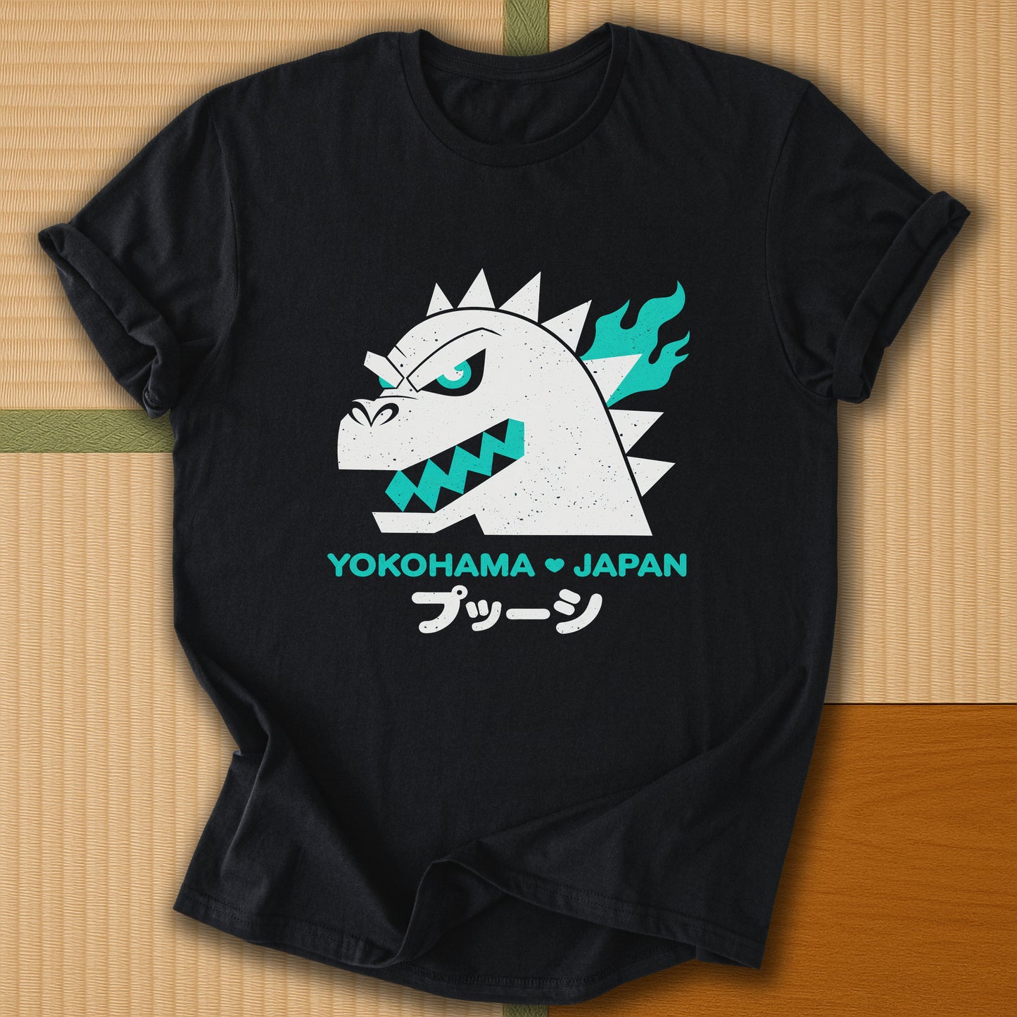 Japanese-inspired cotton Vintage Kaiju Godzilla T-Shirt in Black on Gildan 64000, styled in a modern flatlay scene