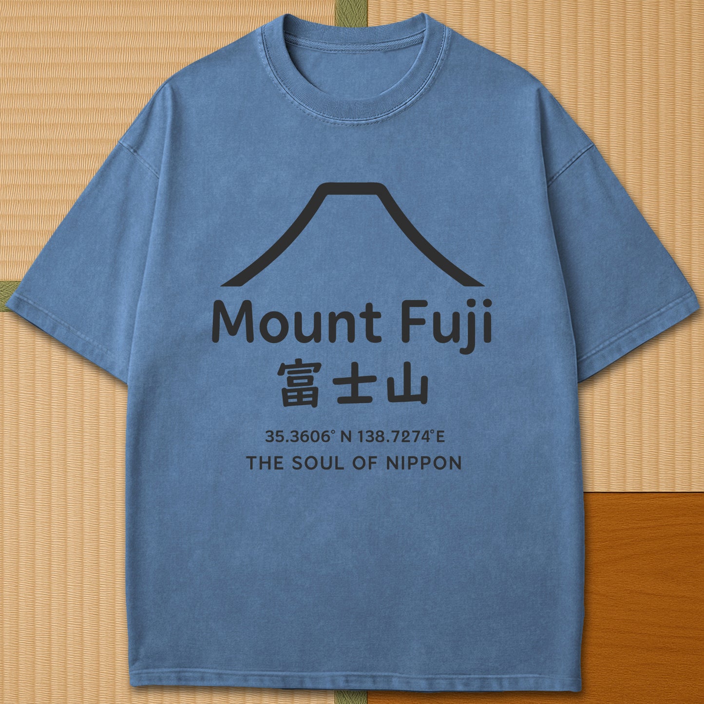 Japanese-inspired cotton Mount Fuji Japan T-Shirt in Blue Jean on Comfort Colors 1717, styled in a modern flatlay scene.