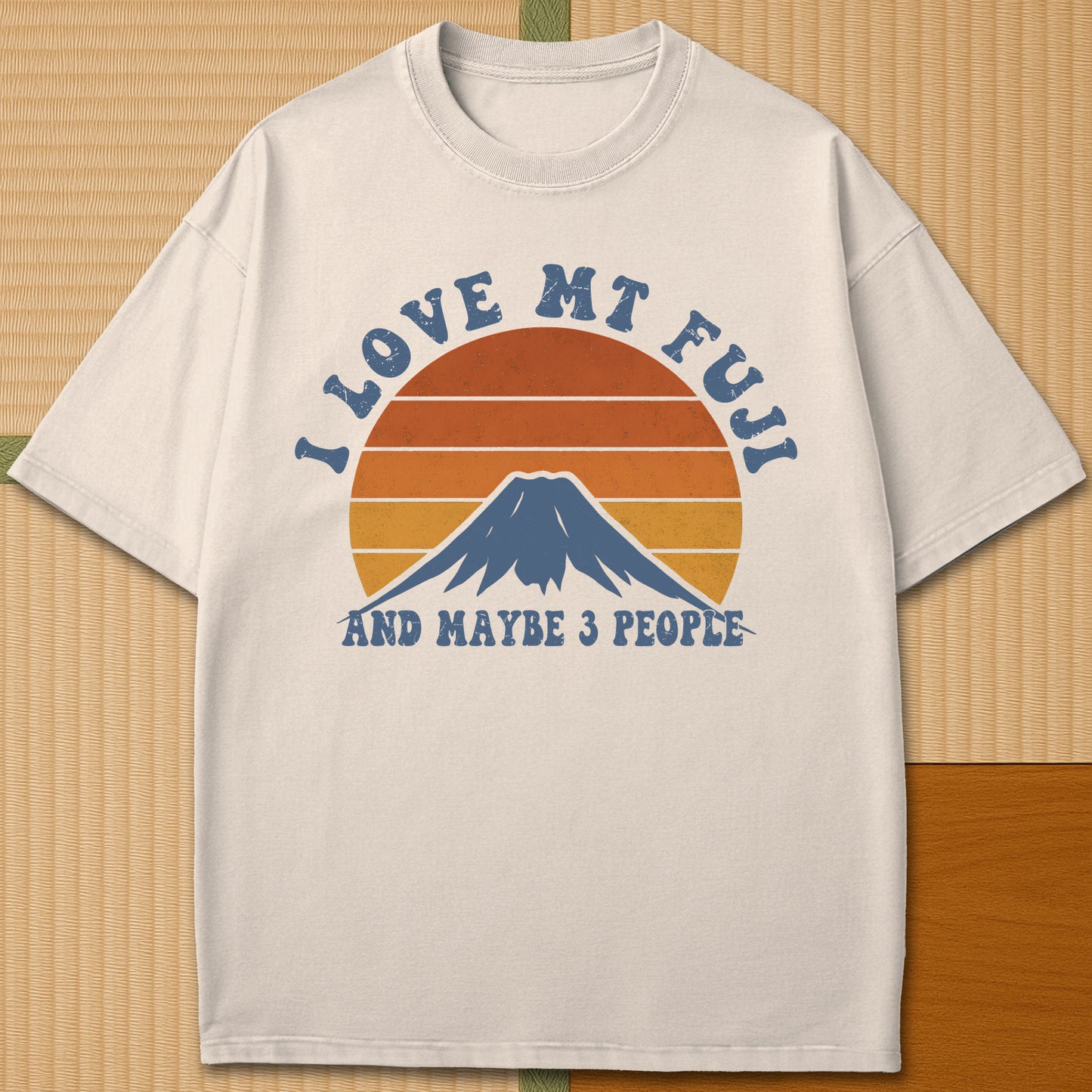 Japanese-inspired cotton Retro Mt Fuji Love T-Shirt in Ivory on Comfort Colors 1717, styled in a modern flatlay scene.