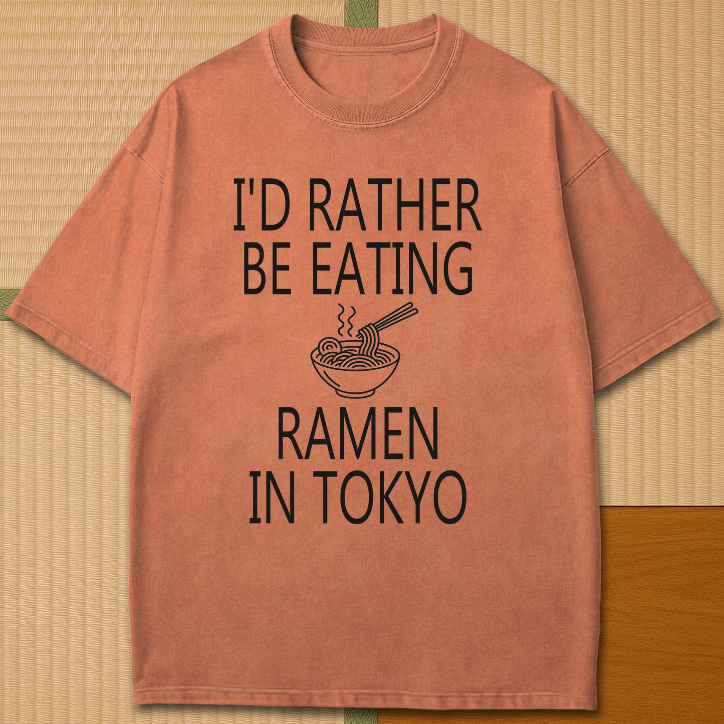 Japanese-inspired cotton Rather Be Eating Ramen T-Shirt in Yam on Comfort Colors 1717, styled in a modern flatlay scene.