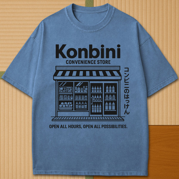 Japanese-inspired cotton Konbini Life T-Shirt in Blue Jean on Comfort Colors 1717, styled in a modern flatlay scene.