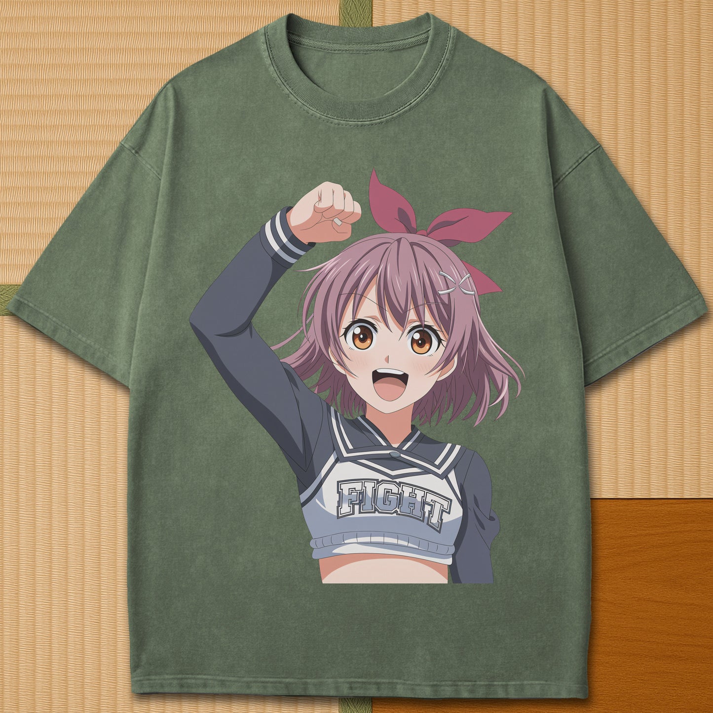 Japanese-inspired cotton Anime Cheerleader T-Shirt in Moss on Comfort Colors 1717, styled in a modern flatlay scene.