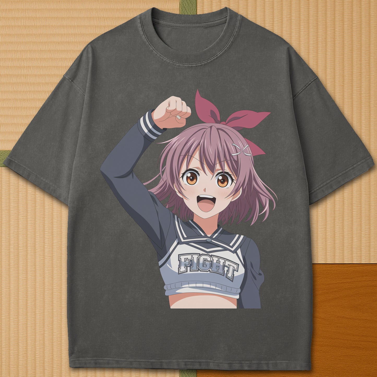 Japanese-inspired cotton Anime Cheerleader T-Shirt in Pepper on Comfort Colors 1717, styled in a modern flatlay scene.