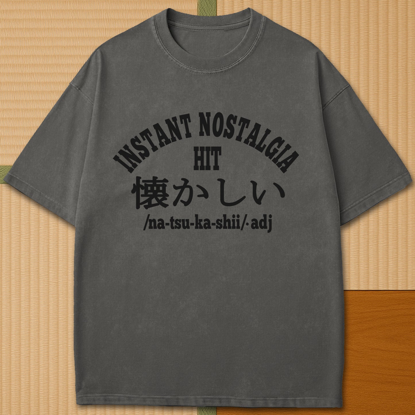 Japanese-inspired cotton Instant Nostalgia Hit T-Shirt in Pepper on Comfort Colors 1717, styled in a modern flatlay scene.