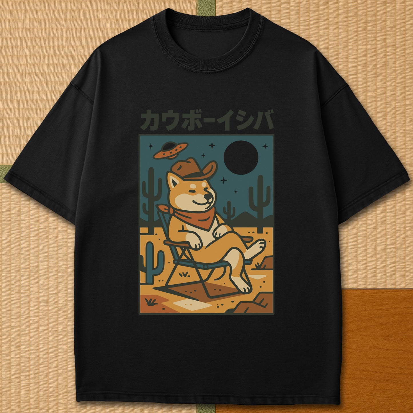 Japanese-inspired cotton Cosmic Cowboy Shiba T-Shirt in Black on Comfort Colors 1717, styled in a modern flatlay scene.