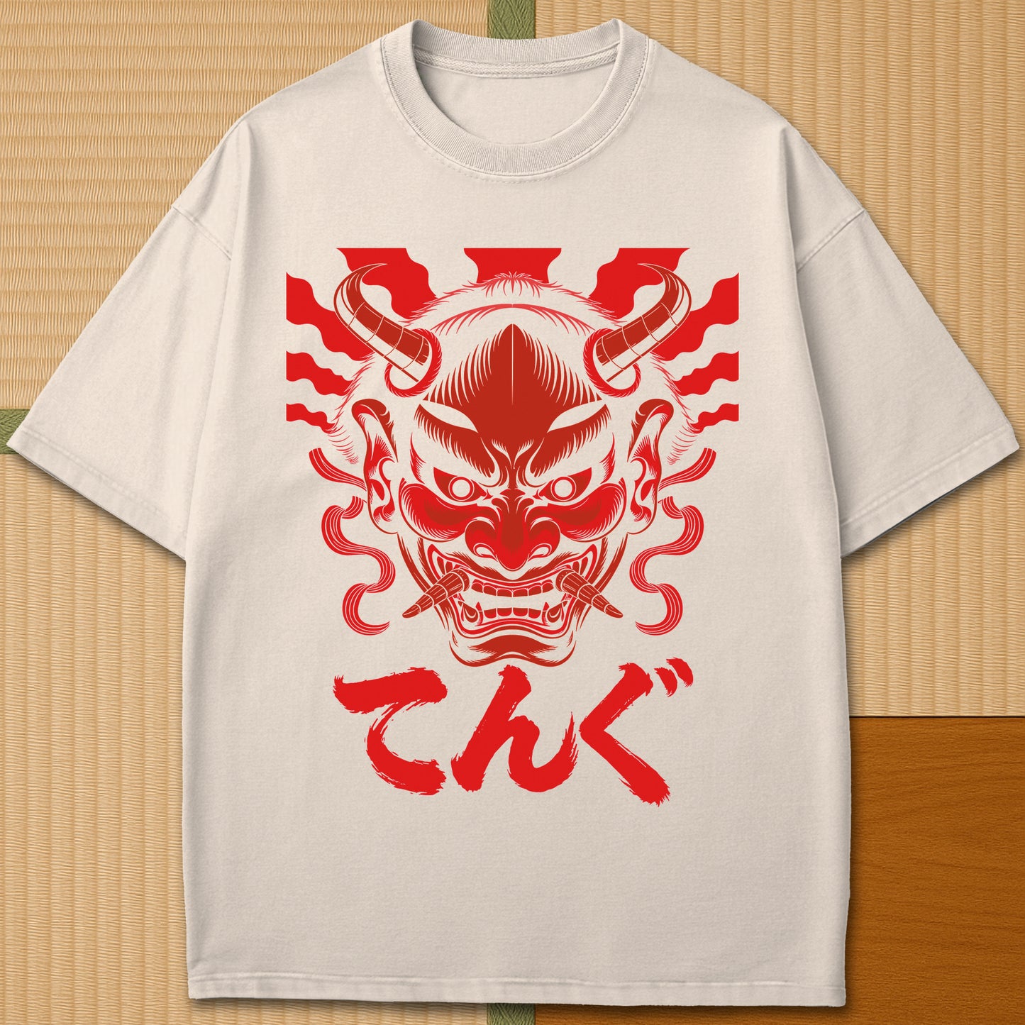 Japanese-inspired cotton Oni Tengu Rising T-Shirt in Ivory on Comfort Colors 1717, styled in a modern flatlay scene.