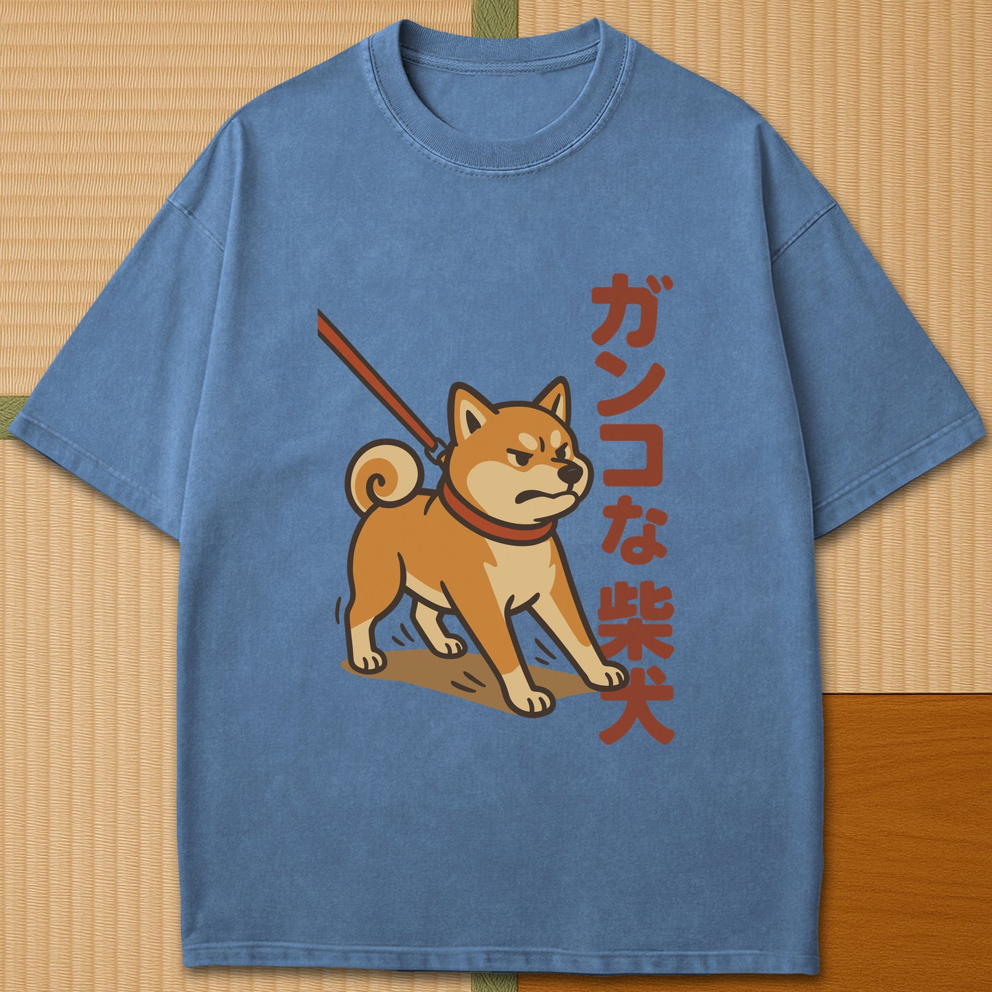 Japanese-inspired cotton Stubborn Shiba T-Shirt in Blue Jean on Comfort Colors 1717, styled in a modern flatlay scene.
