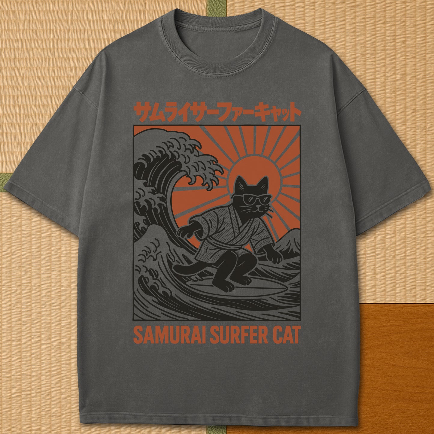 Japanese-inspired cotton Samurai Surfer Cat T-Shirt in Pepper on Comfort Colors 1717, styled in a modern flatlay scene.