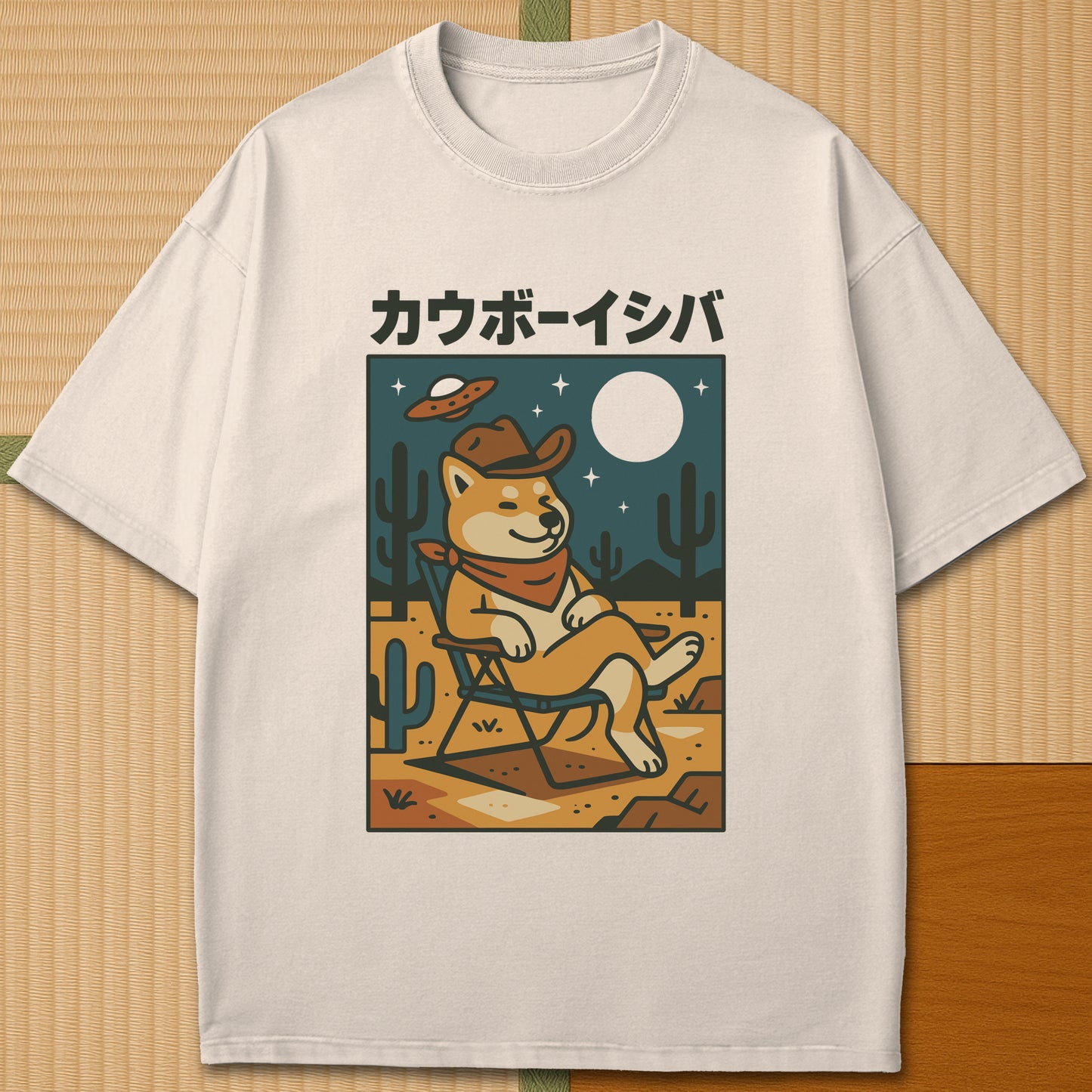 Japanese-inspired cotton Cosmic Cowboy Shiba T-Shirt in Ivory on Comfort Colors 1717, styled in a modern flatlay scene.