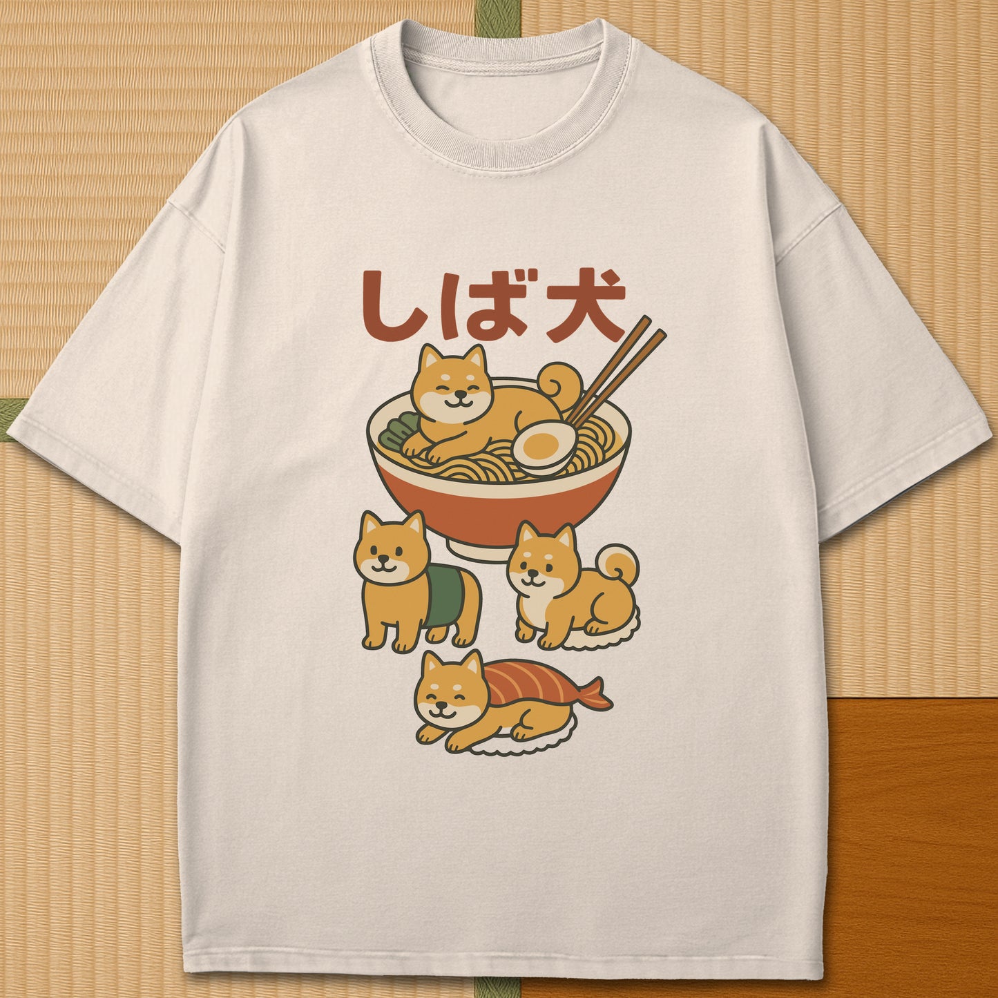 Japanese-inspired cotton Shiba Sushi Ramen Dreams T-Shirt in Ivory on Comfort Colors 1717, styled in a modern flatlay scene.