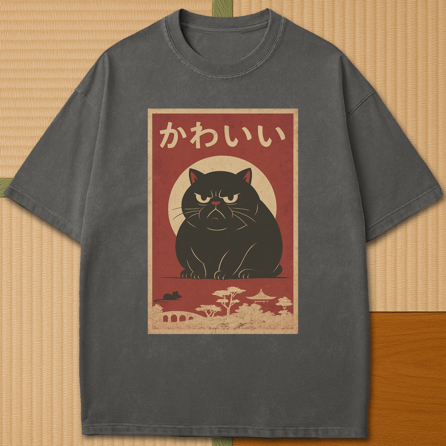 Japanese-inspired cotton Kawaii Rage Cat T-Shirt in Pepper on Comfort Colors 1717, styled in a modern flatlay scene.