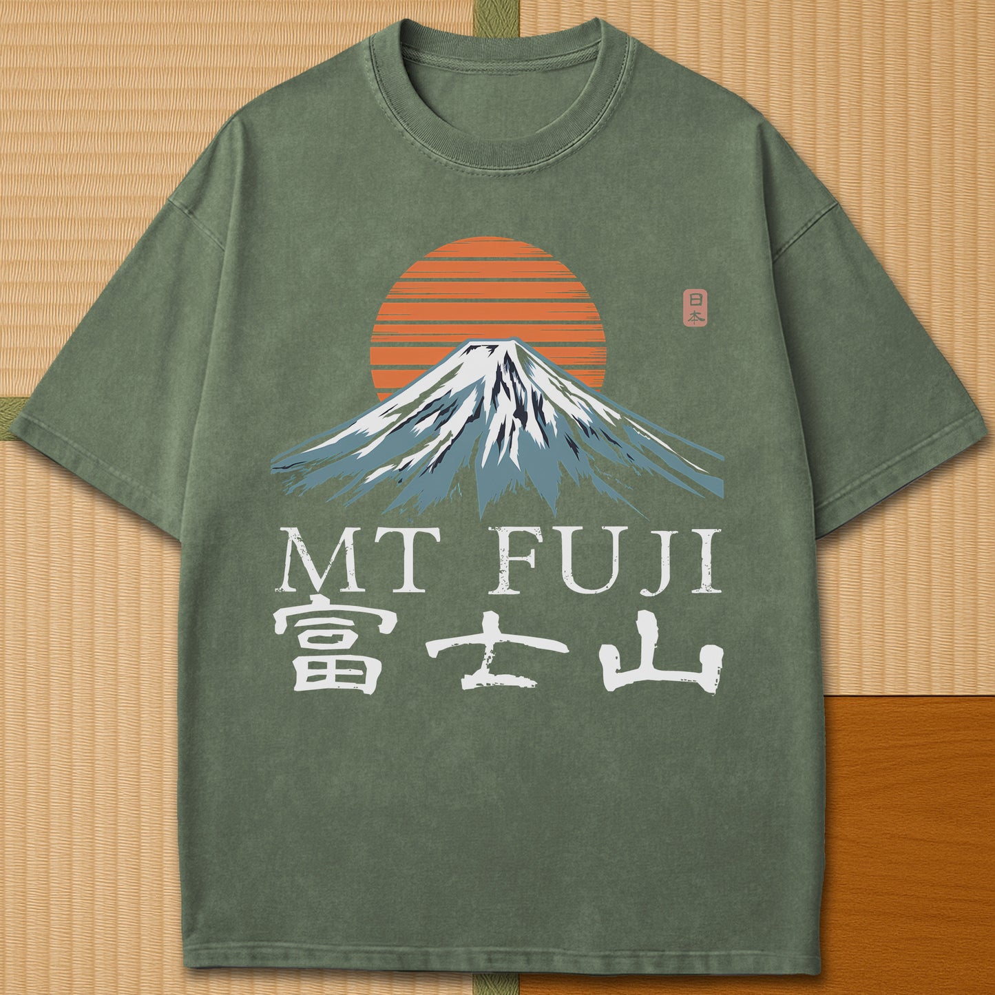 Japanese-inspired cotton Mt Fuji T-Shirt in Moss on Comfort Colors 1717, styled in a modern flatlay scene.