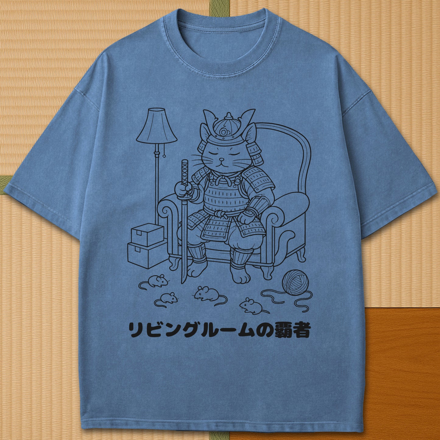 Japanese-inspired cotton The Living Room Shogun Cat T-Shirt in Blue Jean on Comfort Colors 1717, styled in a modern flatlay scene.