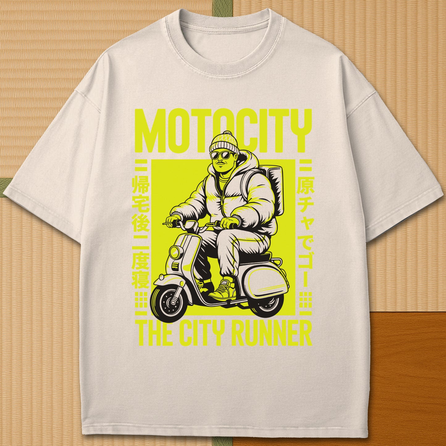 Japanese-inspired cotton Motocity The City Runner T-Shirt in Ivory on Comfort Colors 1717, styled in a modern flatlay scene.