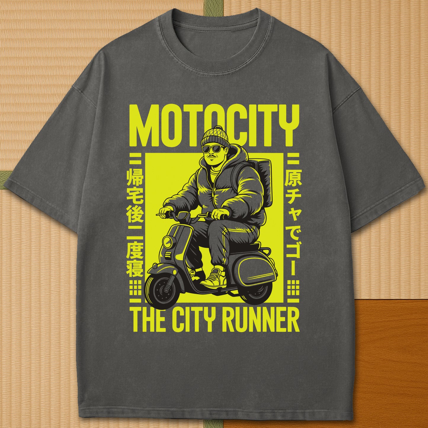 Japanese-inspired cotton Motocity The City Runner T-Shirt in Pepper on Comfort Colors 1717, styled in a modern flatlay scene.
