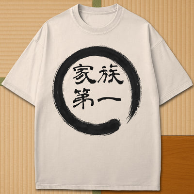 Japanese-inspired cotton Family First In Japanese T-Shirt in Ivory on Comfort Colors 1717, styled in a modern flatlay scene.