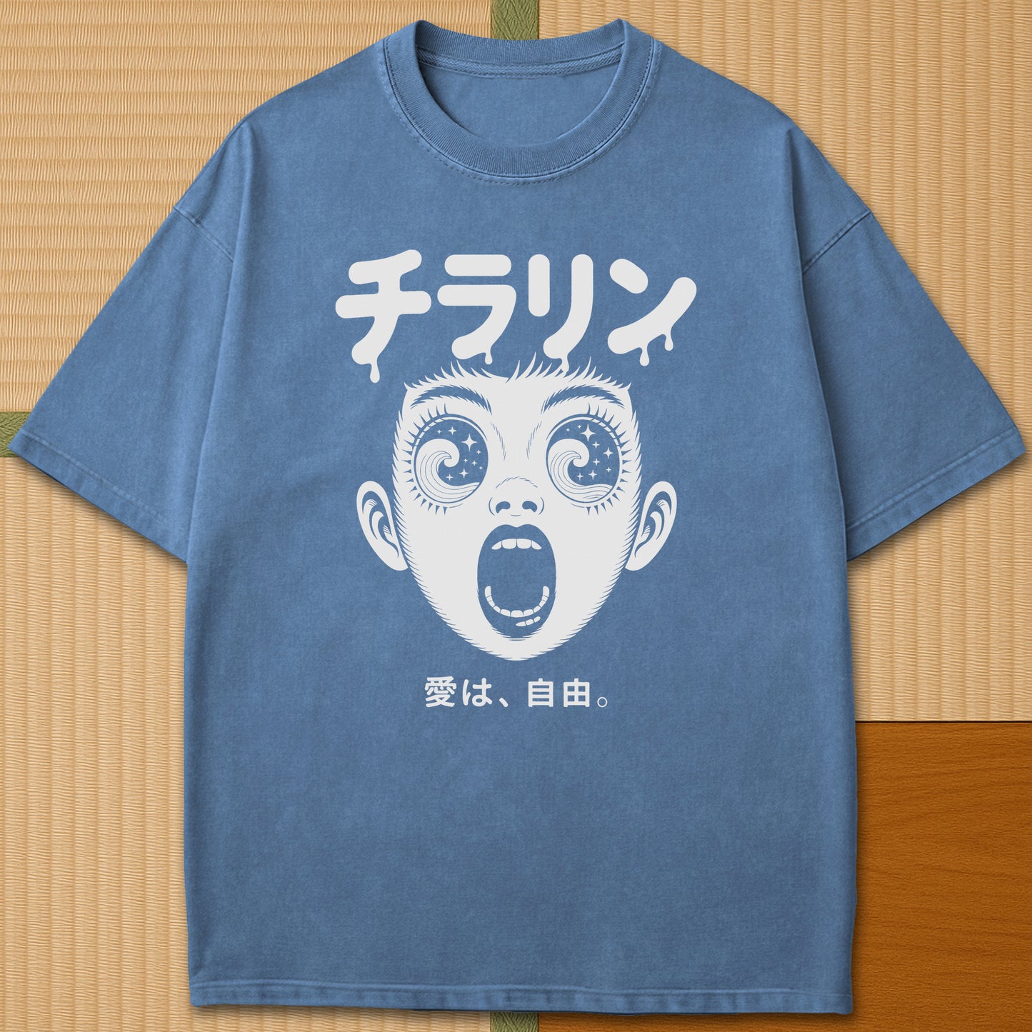 Japanese-inspired cotton Psyche Tsunami T-Shirt in Blue Jean on Comfort Colors 1717, styled in a modern flatlay scene.