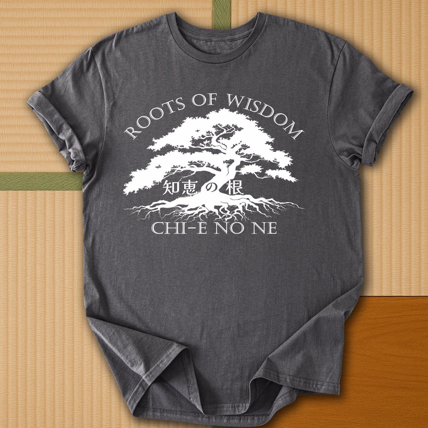 Japanese-inspired cotton Roots of Wisdom T-Shirt in Charcoal on Gildan 64000, styled in a modern flatlay scene