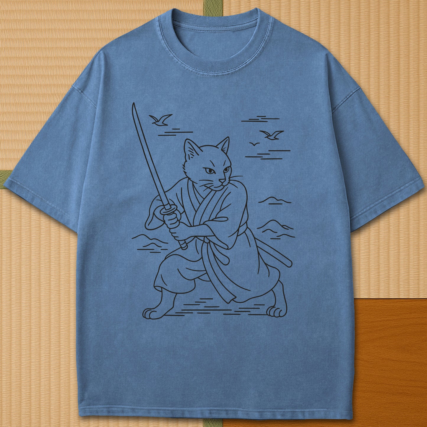 Japanese-inspired cotton Samurai Spirit Cat T-Shirt in Blue Jean on Comfort Colors 1717, styled in a modern flatlay scene.