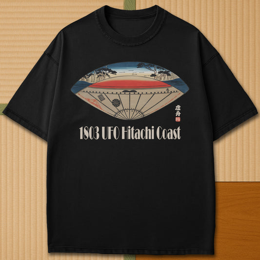 Japanese-inspired cotton 1803 Hitachi Coast Ufo T-Shirt in Black on Comfort Colors 1717, styled in a modern flatlay scene.