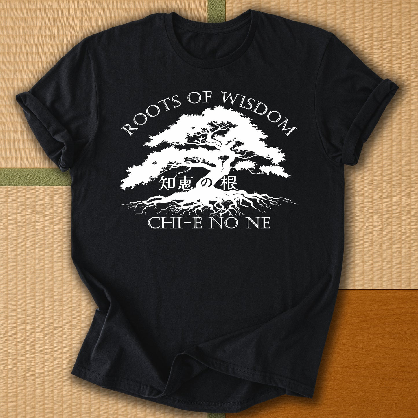 Japanese-inspired cotton Roots of Wisdom T-Shirt in Black on Gildan 64000, styled in a modern flatlay scene