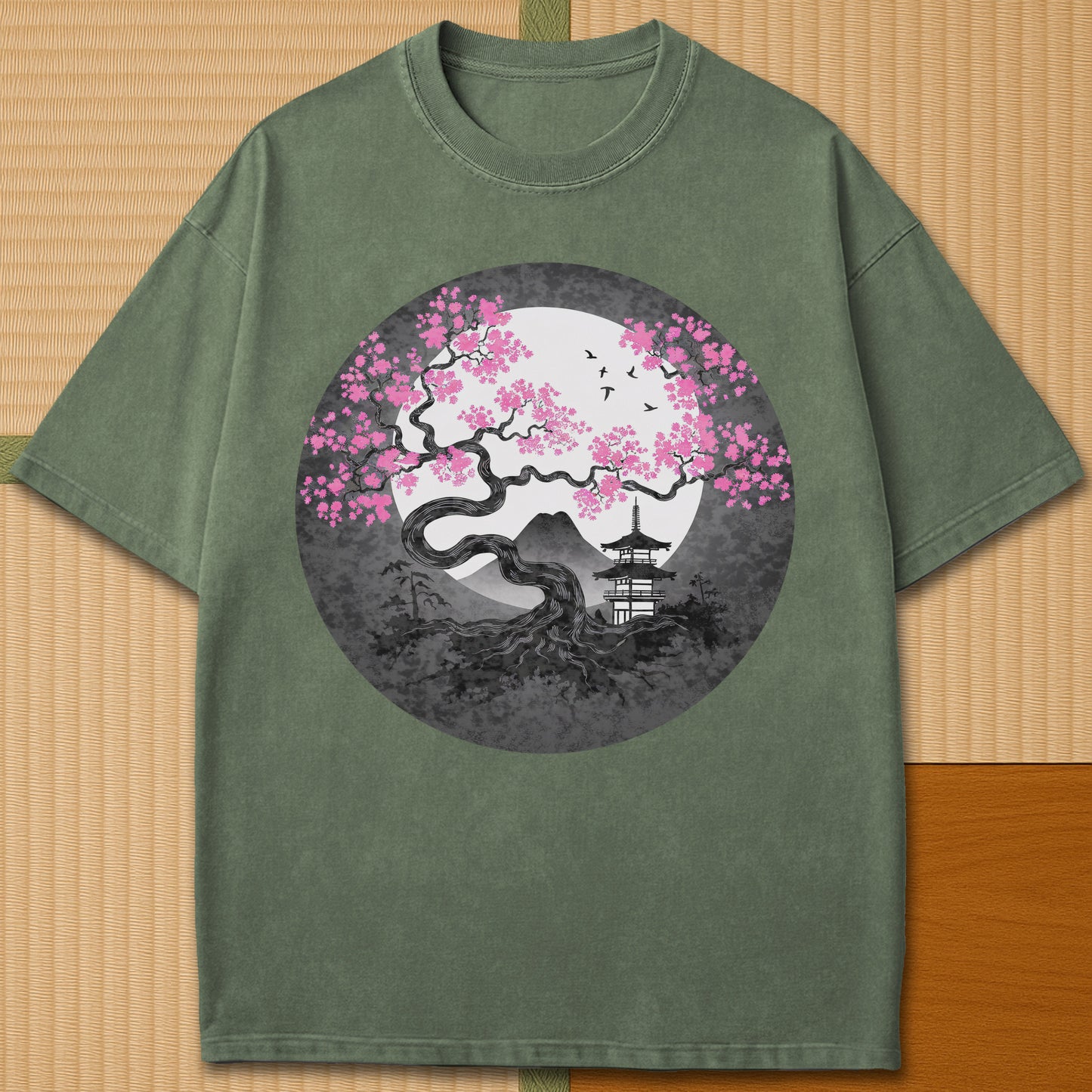 Japanese-inspired cotton Sakura Near Fuji T-Shirt in Moss on Comfort Colors 1717, styled in a modern flatlay scene.