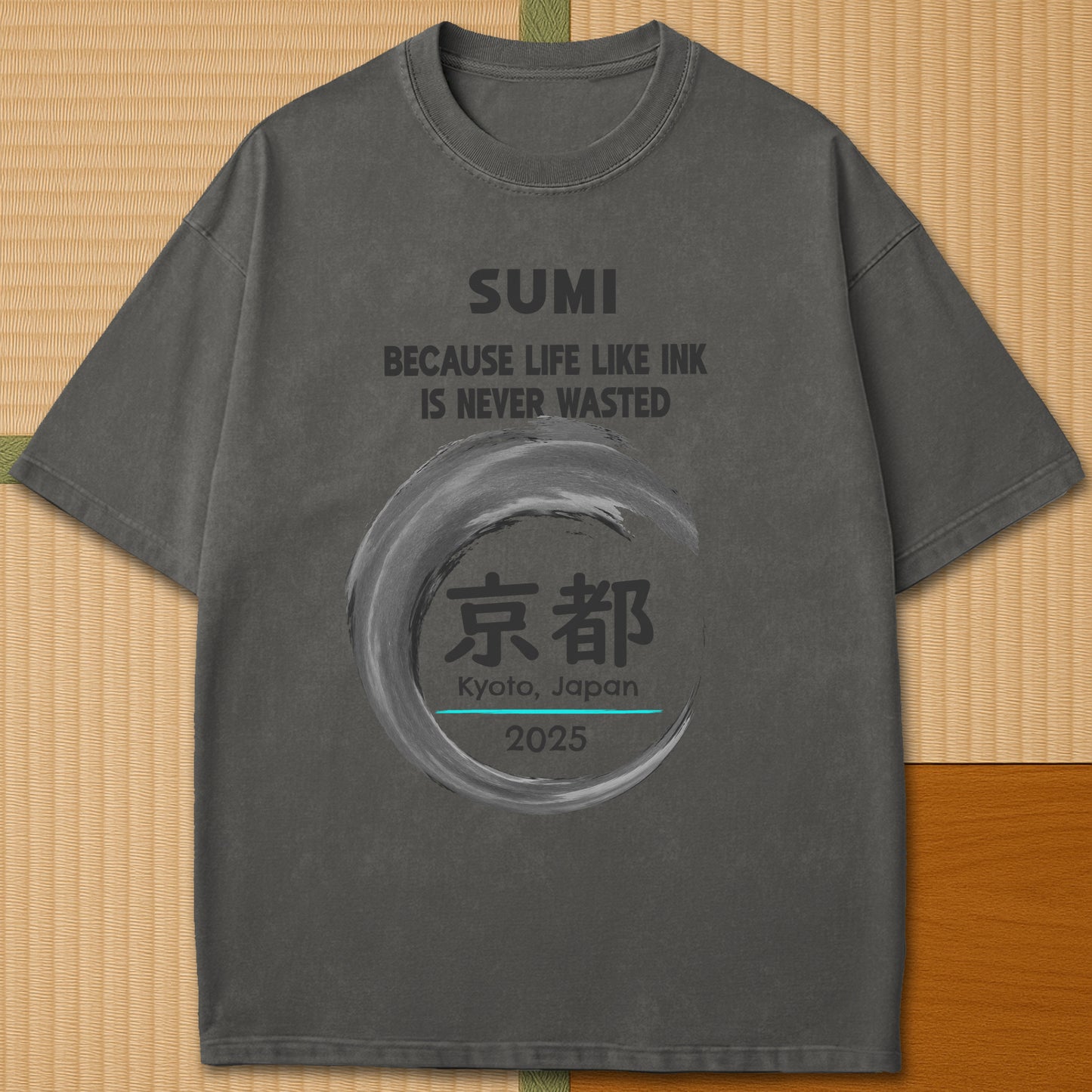 Japanese-inspired cotton Sumi Life Kyoto T-Shirt in Pepper on Comfort Colors 1717, styled in a modern flatlay scene.