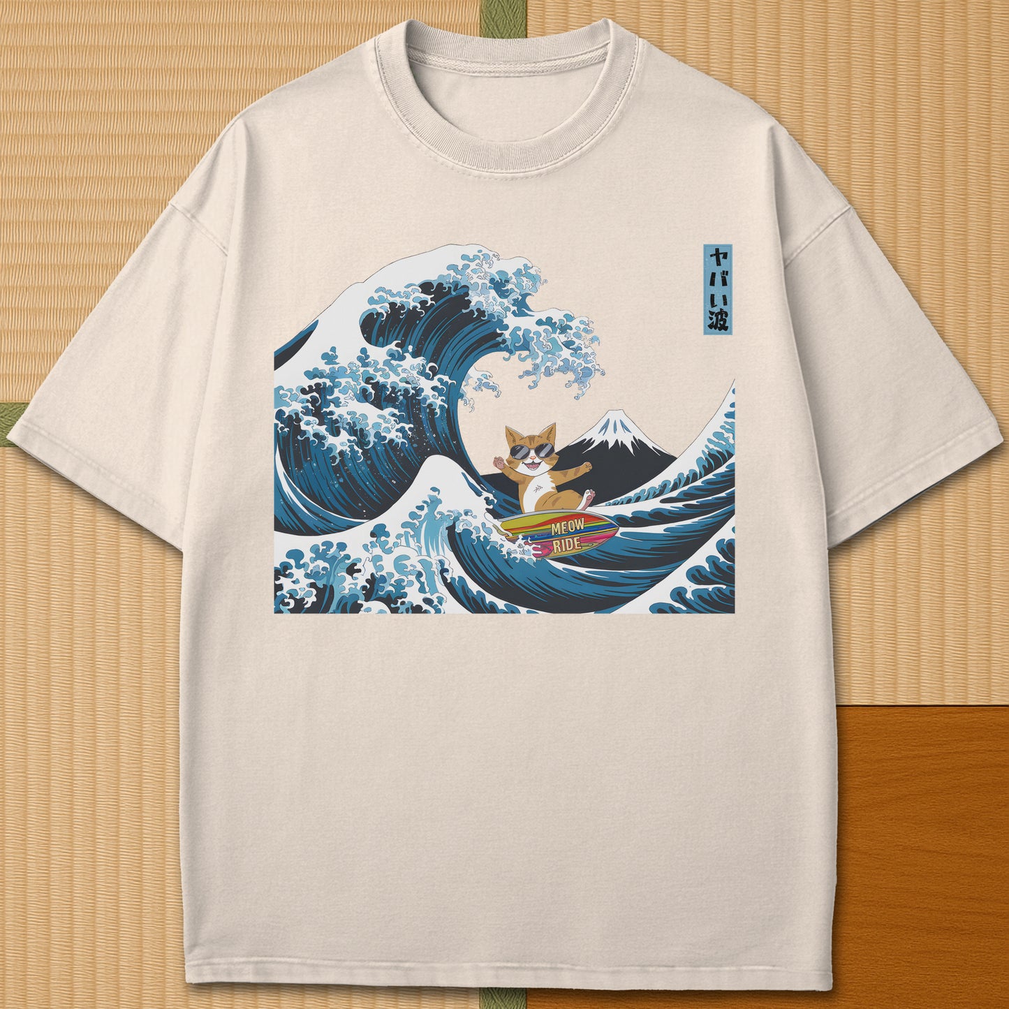 Japanese-inspired cotton Meow Ride T-Shirt in Ivory on Comfort Colors 1717, styled in a modern flatlay scene.
