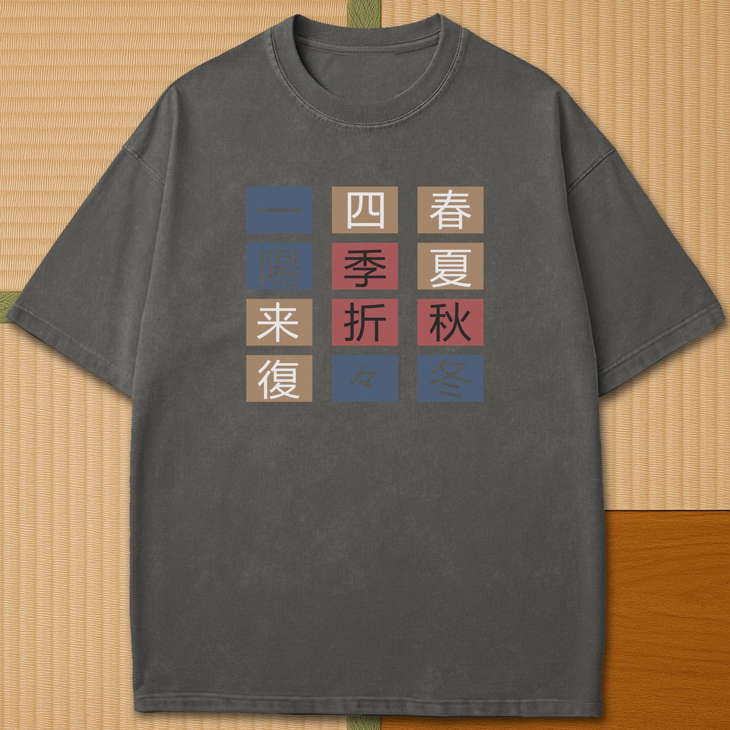 Japanese-inspired cotton The Seasons T-Shirt in Pepper on Comfort Colors 1717, styled in a modern flatlay scene.