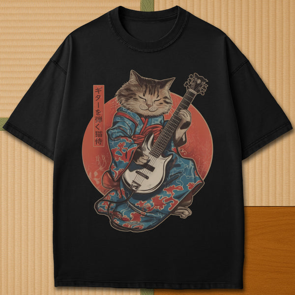 Japanese-inspired cotton Samurai Cat On Guitar T-Shirt in Black on Comfort Colors 1717, styled in a modern flatlay scene.